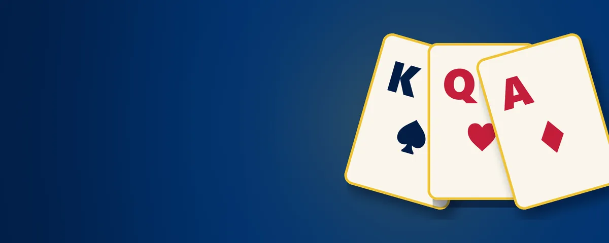 Three playing cards, king, queen and ace